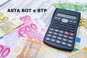 banconote euro, calcolatrice, scritta asta bot e btp