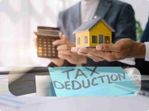 Modellino casa con scritta tax deduction